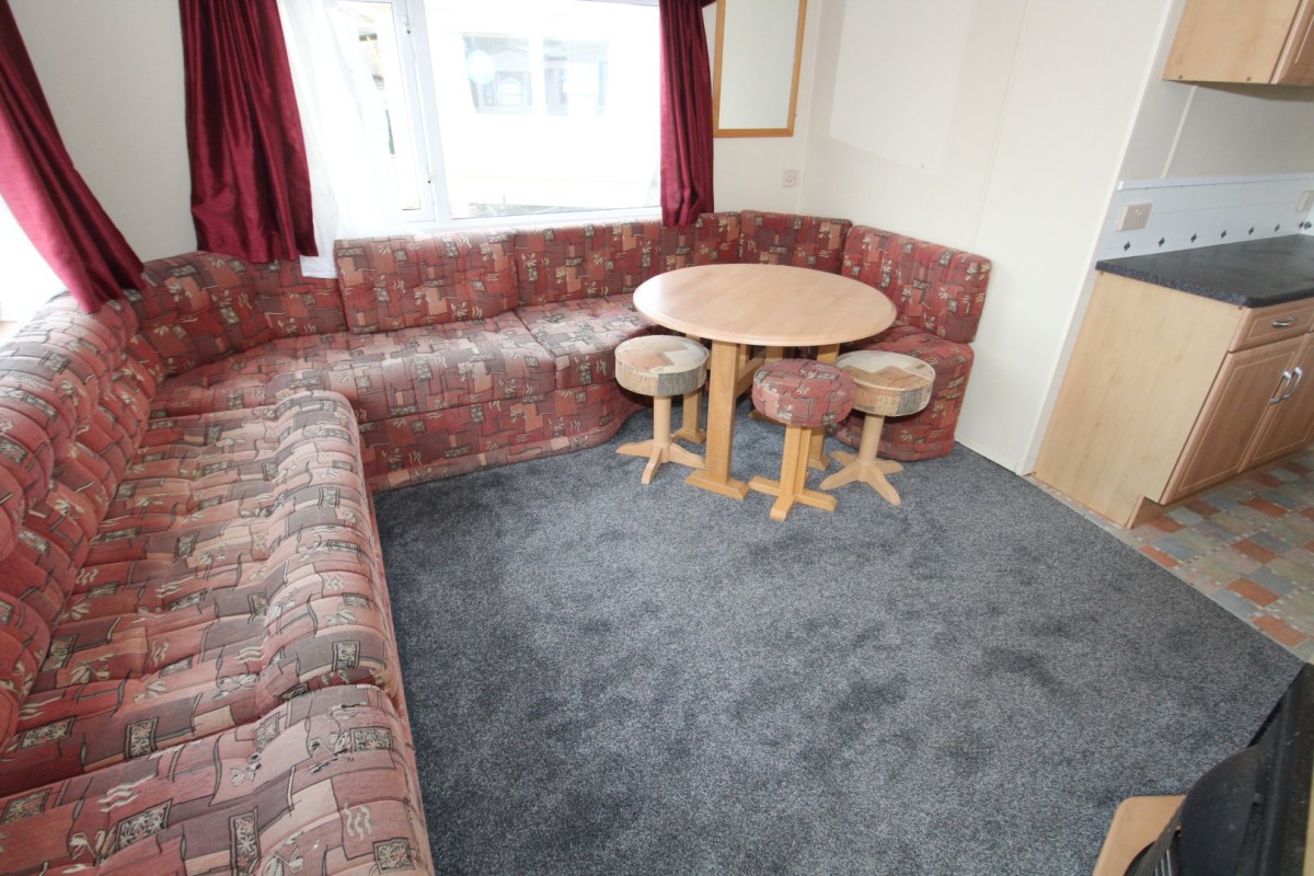 lounge with dining table in the 2004 Cosalt Albany Super