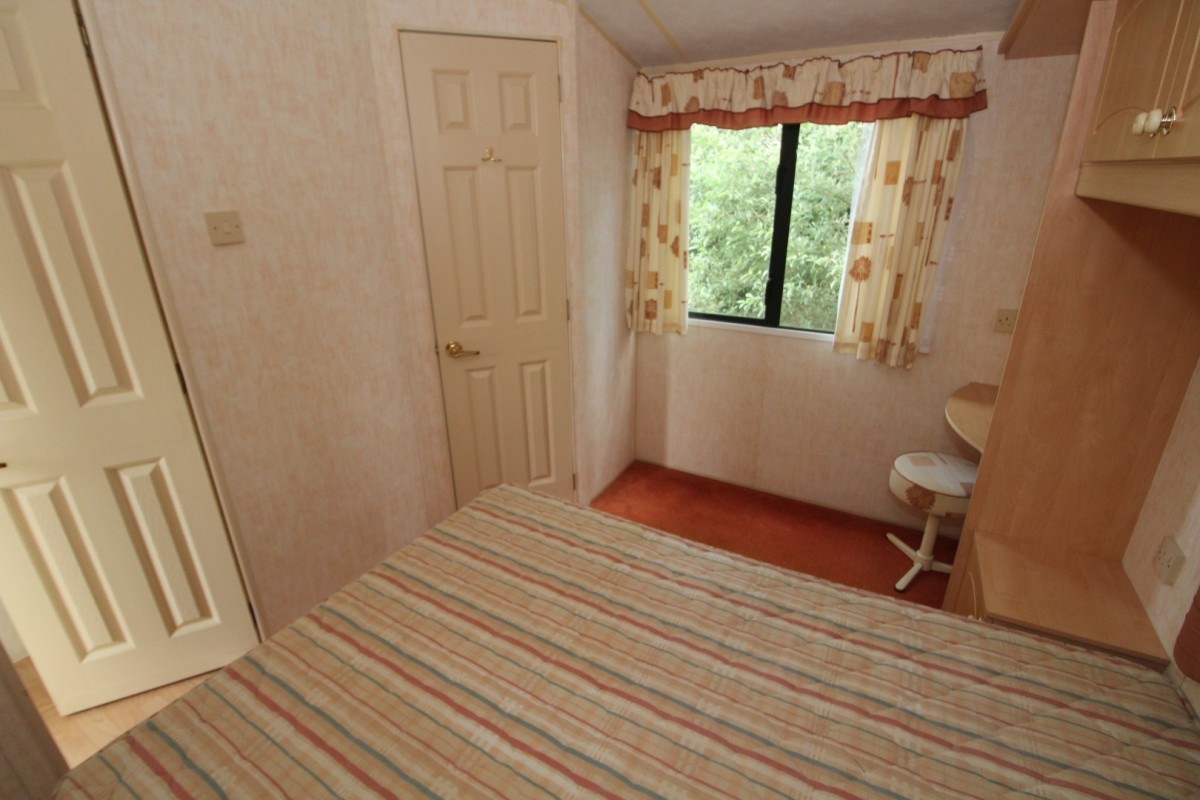 double bedroom with door