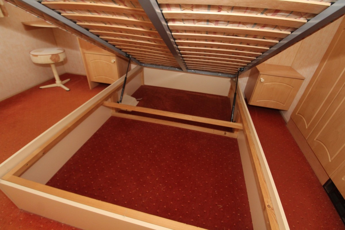 lift up bed in the double bedroom