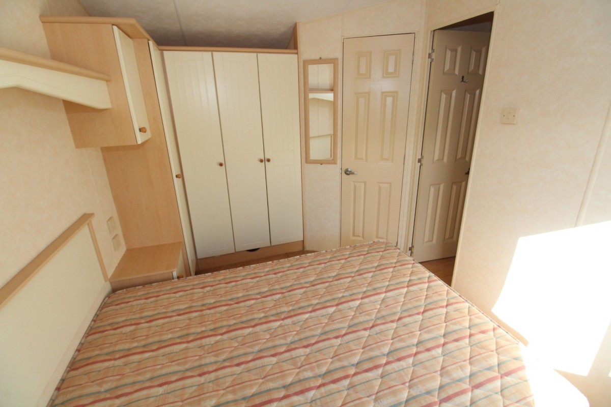 double bedroom with wardrobes in the 2007 Willerby Richmond