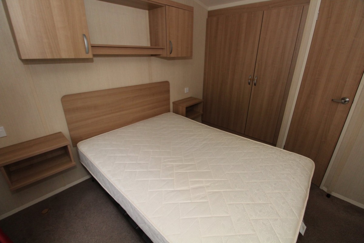 double bedroom with wardrobes in the 2014 Swift Loire