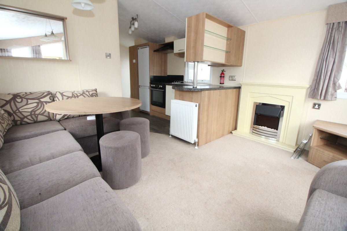 dining area to kitchen in the 2012 Willerby New Hampton