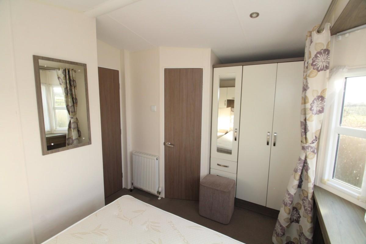 double bedroom with wardrobes in the 2015 Willerby Cameo