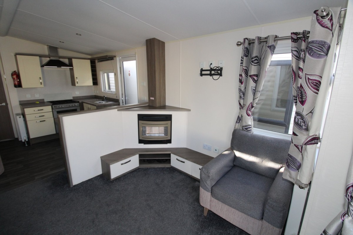 lounge with fire in the 2015 Willerby Cameo