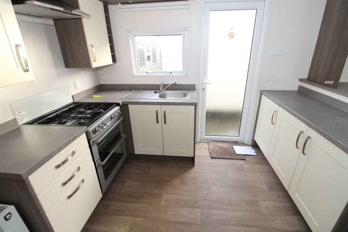 kitchen by side door in the 2015 Willerby Cameo