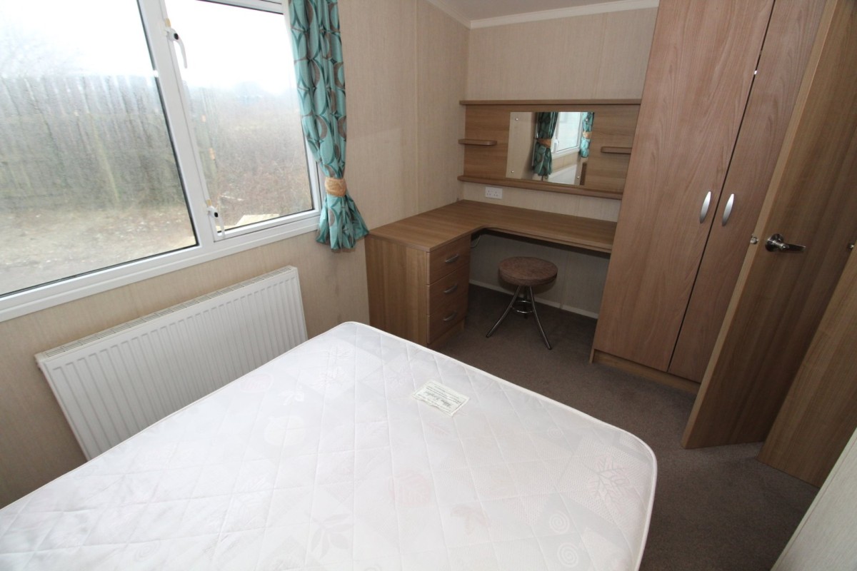 double bedroom with dressing table in the 2012 Swift Bordeaux