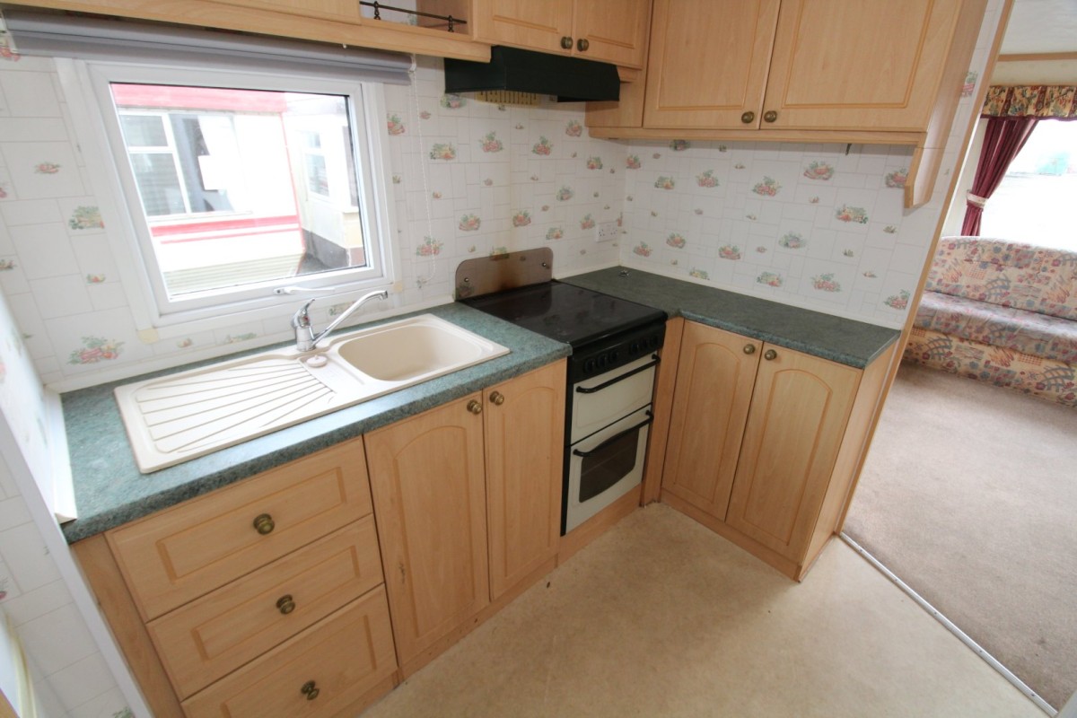 kitchen with oven and sink