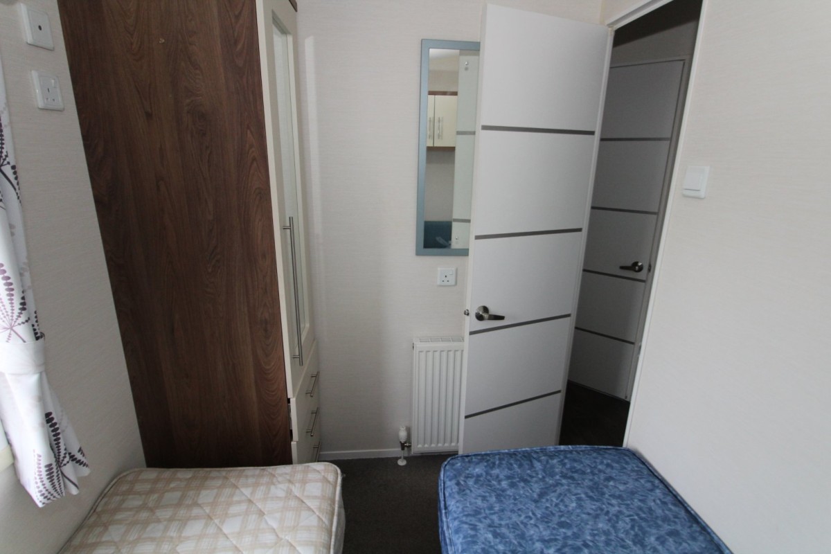 twin beds in the third bedroom