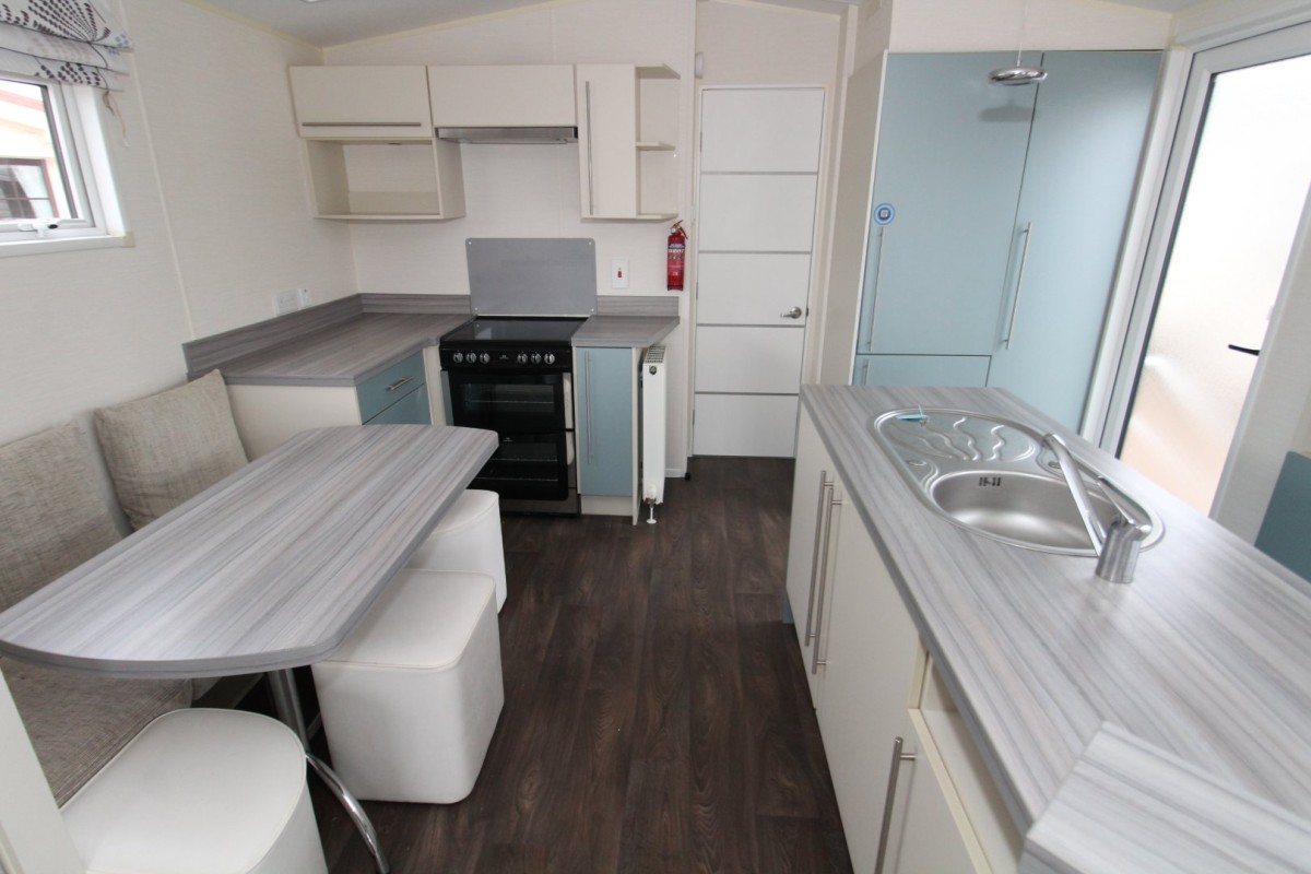 kitchen with breakfast bar in the 2015 Willerby Azure