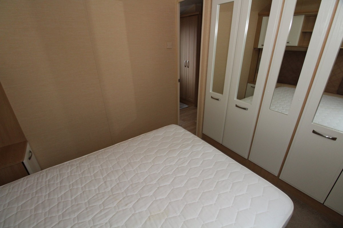 double bedroom with wardrobes in the 2010 Willerby Granada