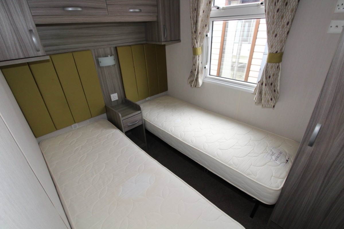 twin bedroom in the 2015 Swift Moselle