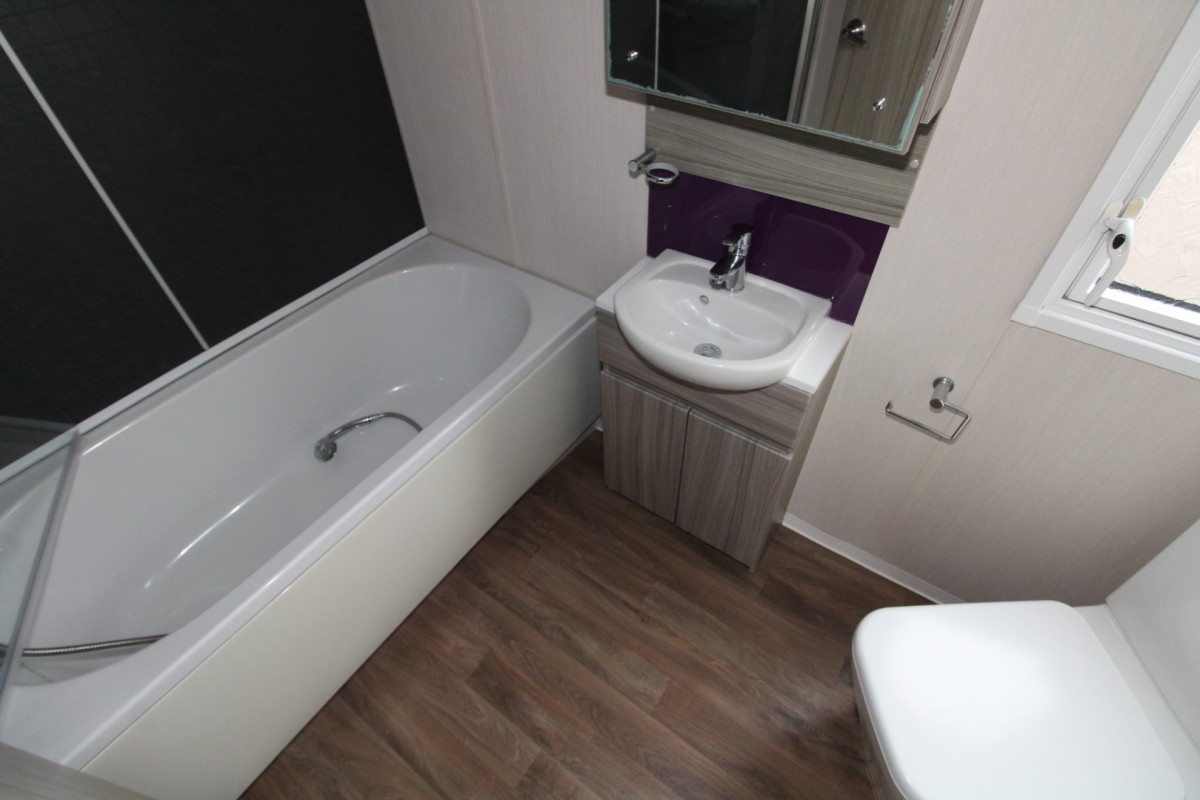 en-suite bathroom with full size bath in the 2015 Swift Moselle