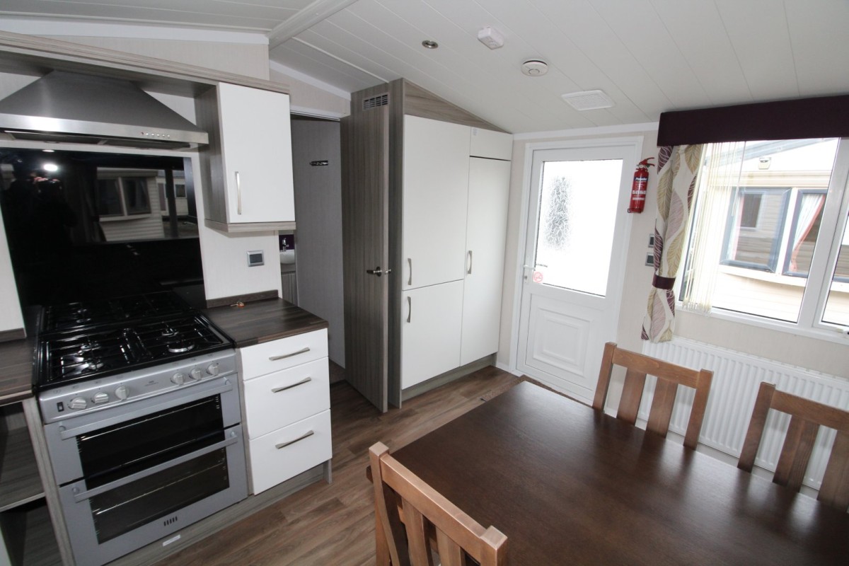 dining area to kitchen in the 2015 Swift Moselle