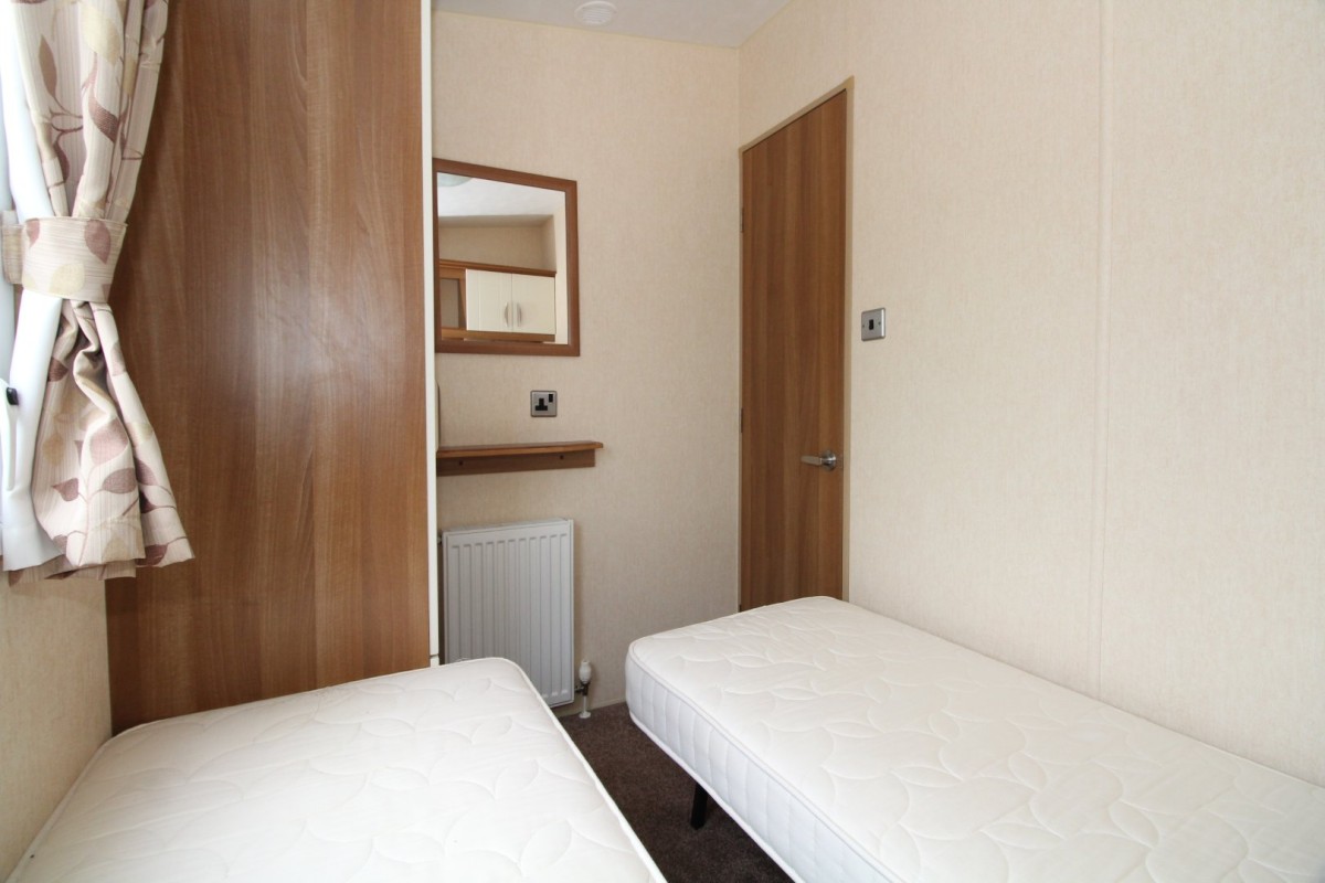 second view of twin bedroom