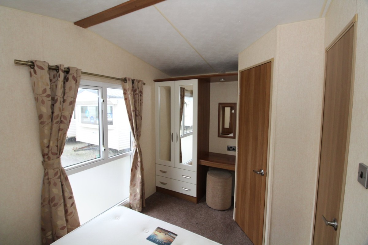 double bedroom with large windows in the 2012 ABI St David