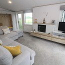 2023 Atlas Oakwood Lodge sofas in lounge with tv