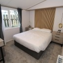 luxury double bedroom in the 2023 Atlas Lilac Lodge