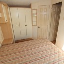 double bedroom with wardrobes in the 2007 Willerby Richmond