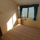 double bed by windows in the 2007 Willerby Richmond