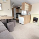 dining area to kitchen in the 2012 Willerby New Hampton