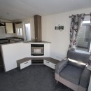 lounge with fire in the 2015 Willerby Cameo