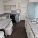 kitchen with breakfast bar in the 2015 Willerby Azure