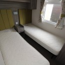 twin bedroom in the 2015 Swift Moselle