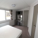 double bedroom with dressing table in the 2015 Swift Moselle