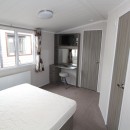 double bedroom with dressing table in the 2015 Swift Moselle