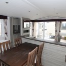 2015 Swift Moselle dining area to front patio doors