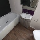 en-suite bathroom with full size bath in the 2015 Swift Moselle