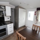 dining area to kitchen in the 2015 Swift Moselle