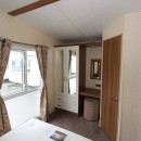 double bedroom with large windows in the 2012 ABI St David